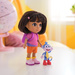 Lalka Dora Dora Poznaje Świat 15 cm Zestaw figurka Butek Boots + plecak
