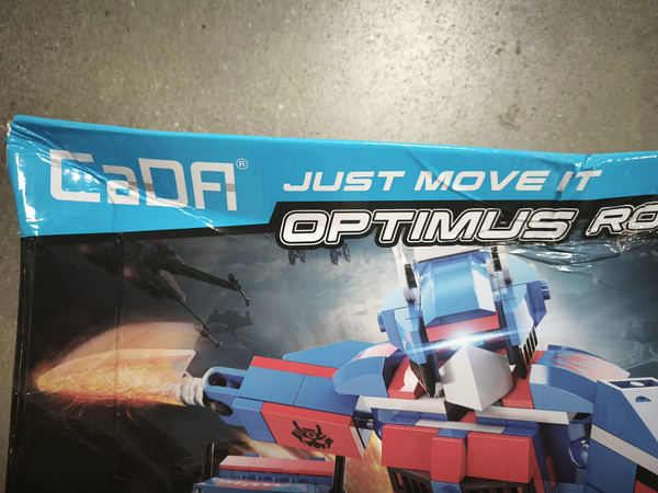 OUTLET Klocki konstrukcyjne CaDA Optimus Robot Ciężarówka 2w1 Pull-back 251 elementów USZKODZONE OPAKOWANIE