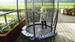 Trampolina ogrodowa Tiggy junior z siatką zabezpieczającą 140 cm czarno-szara