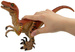 Kinetic Sand Dino XCavate zestaw poszukiwanie szkieletu dinozaura piasek i akcesoria oraz figurka Velociraptor 19 cm