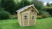 Drewniany domek ogrodowy do zabawy Crooky 100 szaro-beżowy